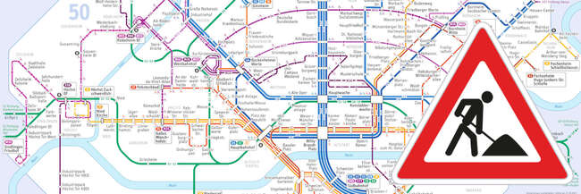 Ausschnitt Frankfurter Liniennetzplan, rechts ein Achtung-Baustelle-Schild