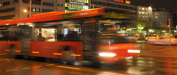 Red bus at night in the city Red bus at night in the city